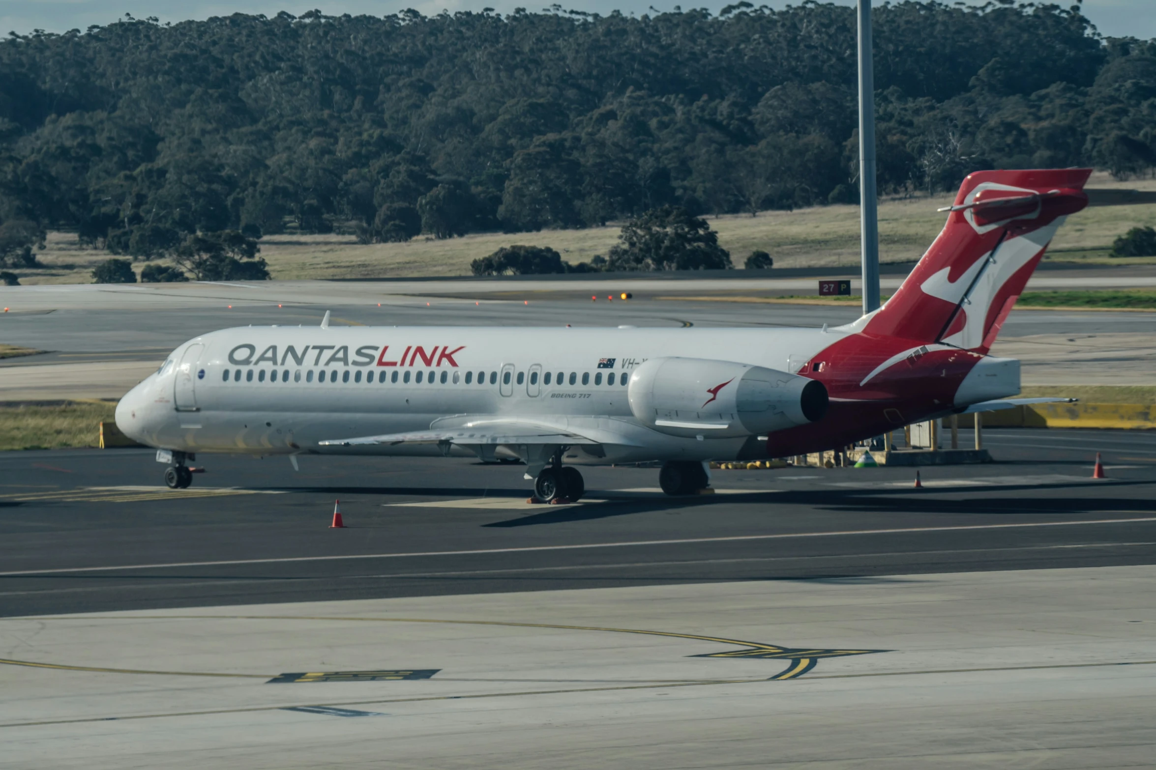 a large passenger jet sitting on top of an airport runway