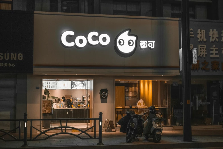 a night scene showing a coco shop with no signage