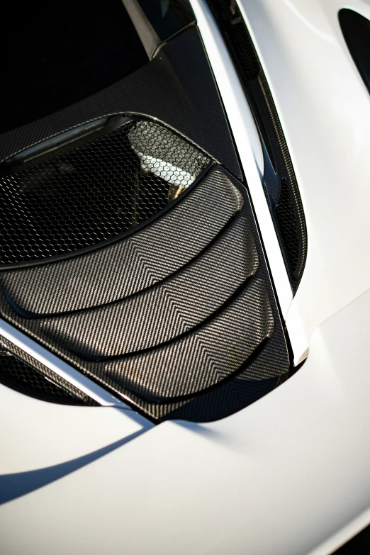 the front end of a car, shown from the hood