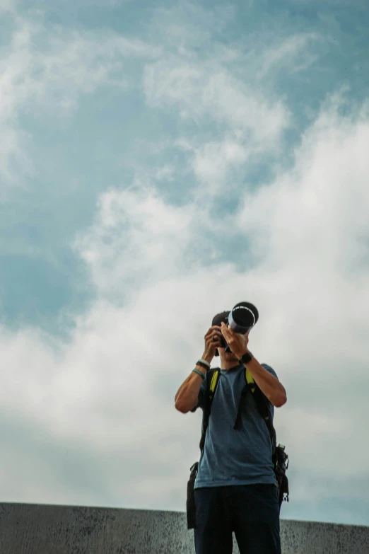 a man taking a picture with his camera