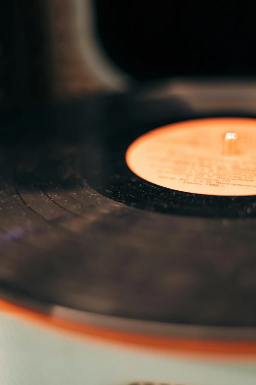 a close - up s of a record player and it's disk