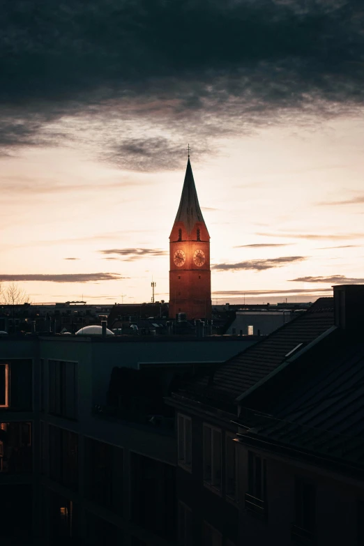 the view from a balcony of an old building and the clock tower