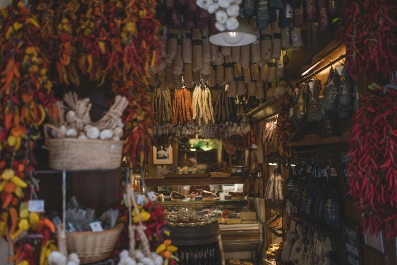 the large display case with lots of colorful hanging objects