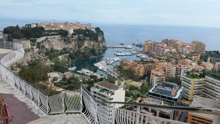 a scenic view of a city that looks out over the water