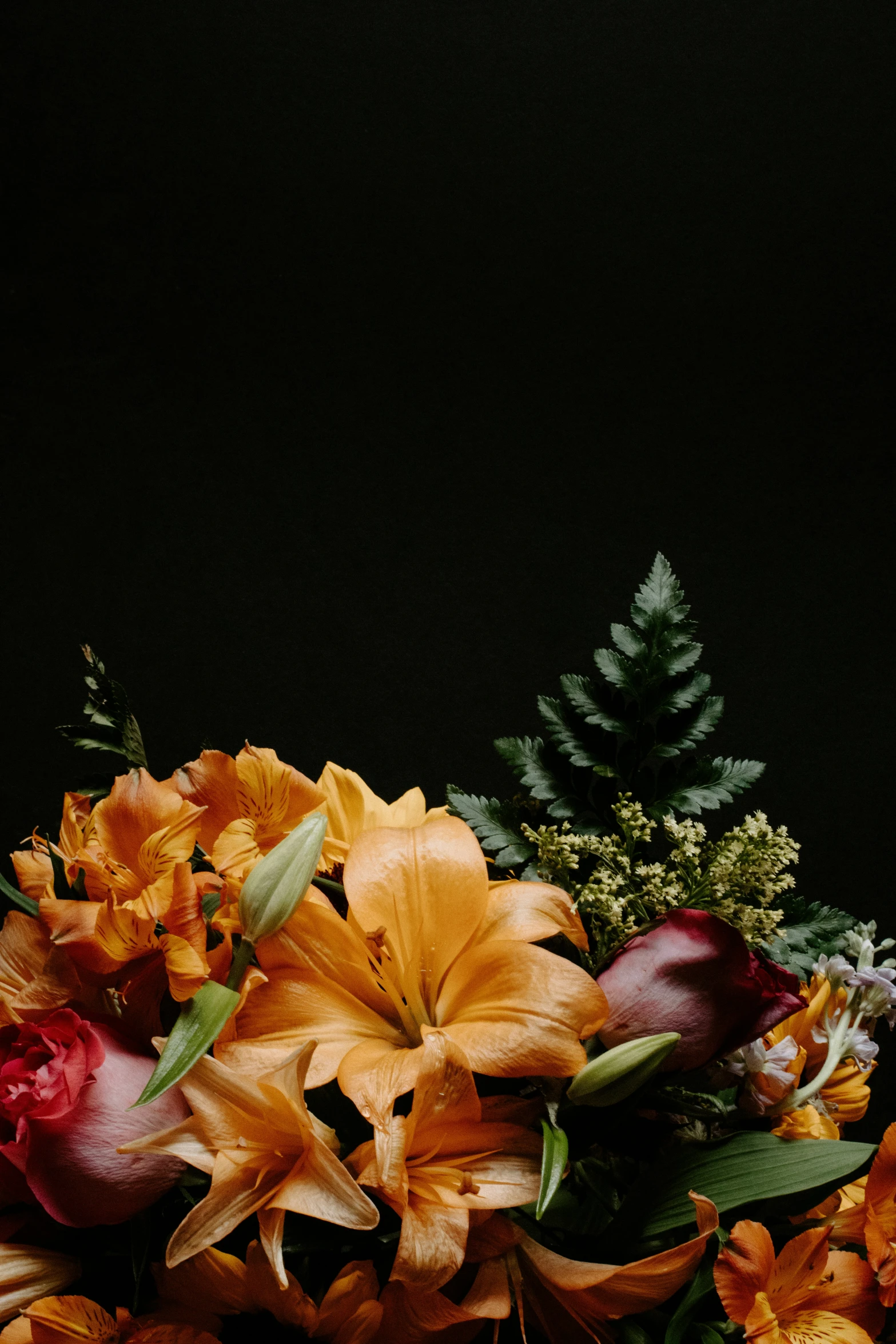 a bunch of flowers are sitting in a vase