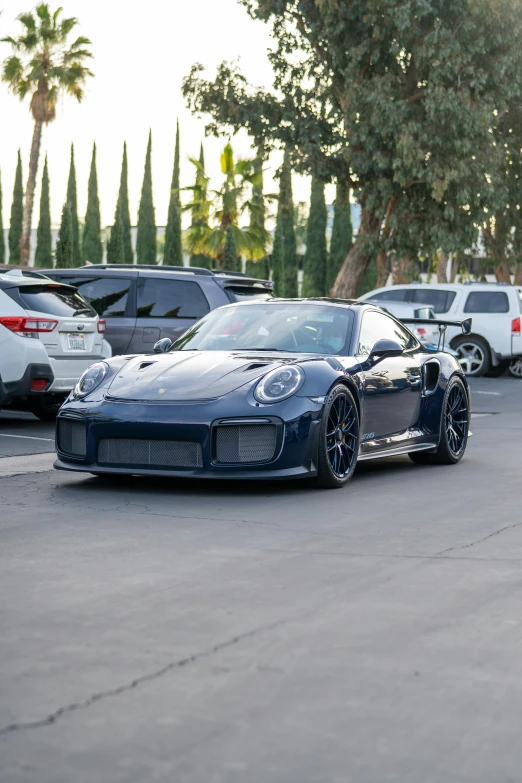 a black sports car parked in the street