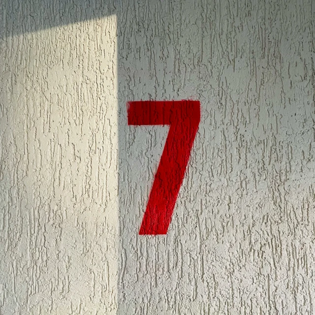 a number seven on the side of a building