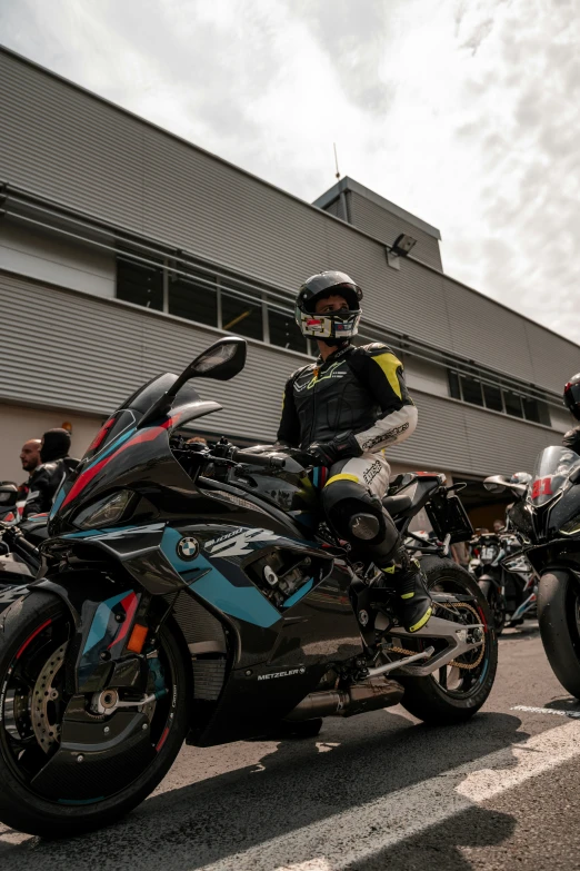 some guys sitting on bikes next to each other