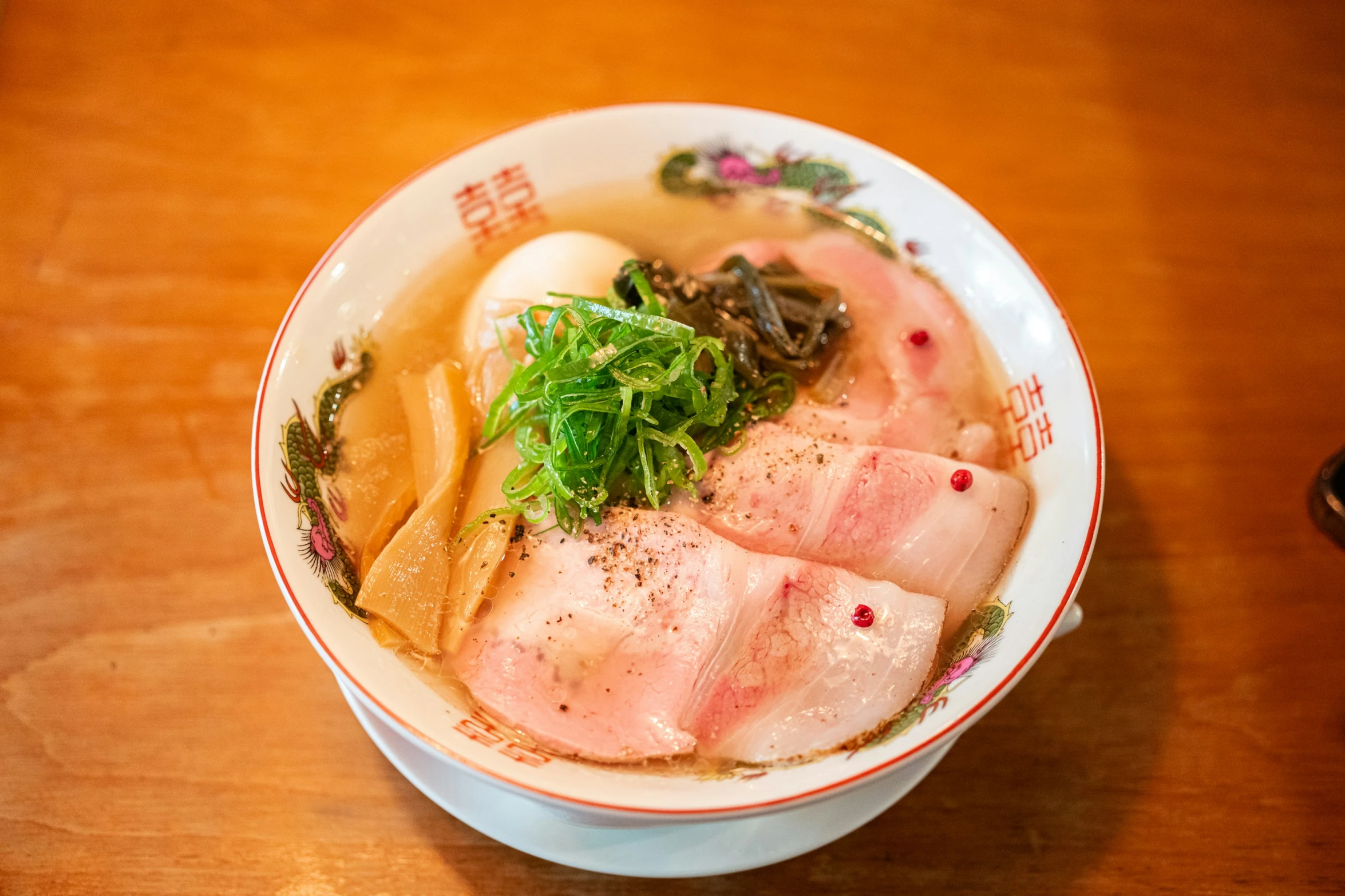 soup with noodle is served in a bowl