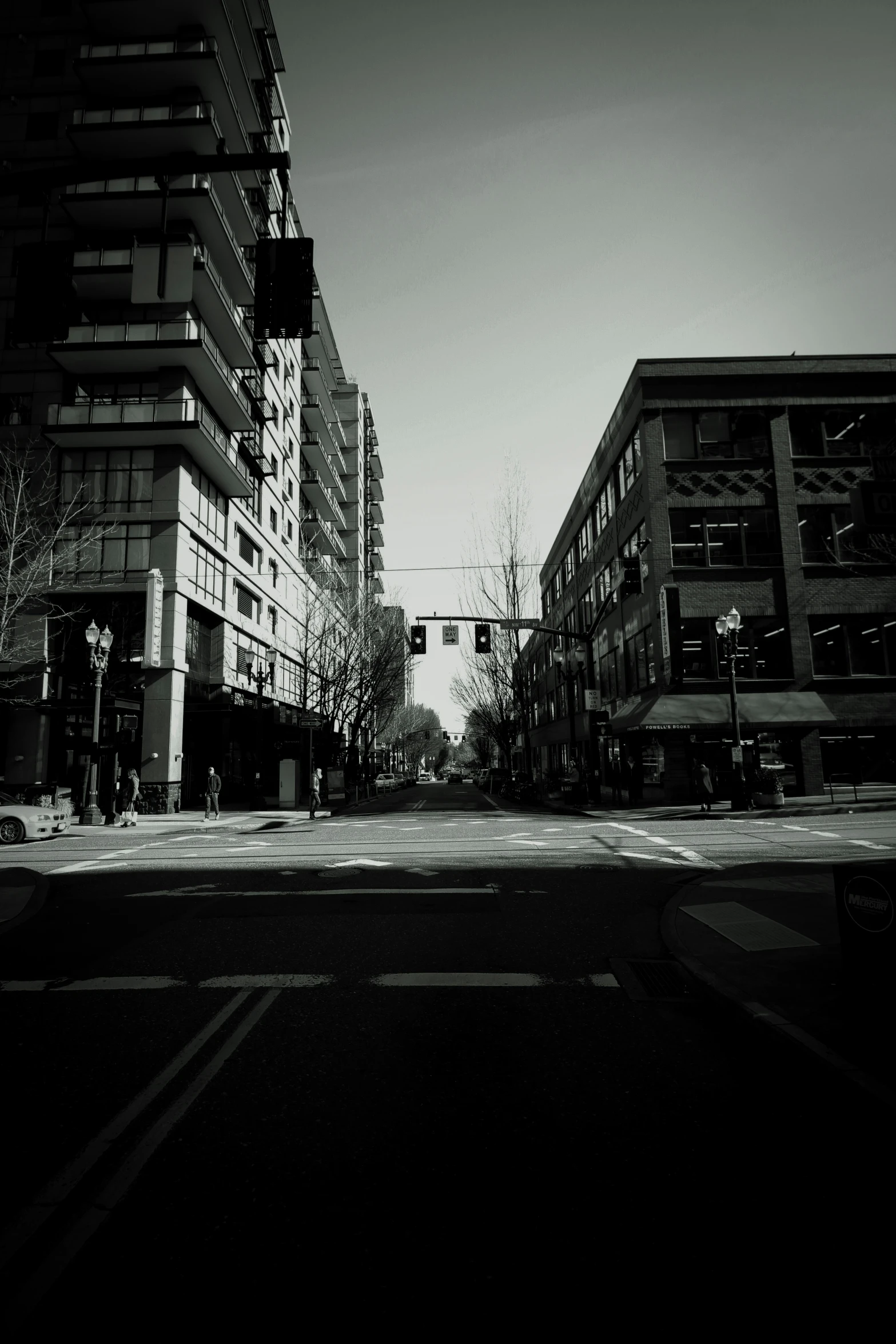 a street with some buildings on both sides of the road