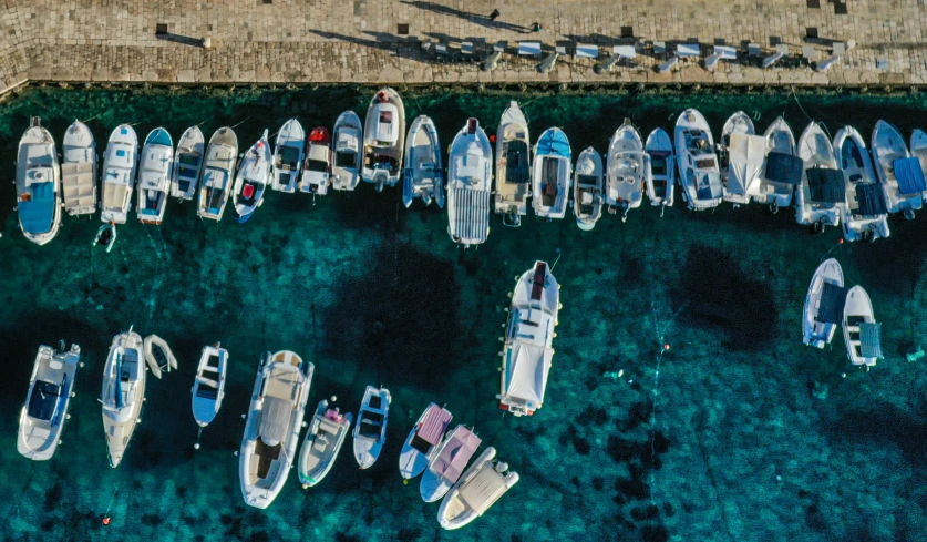 a marina filled with lots of white boats