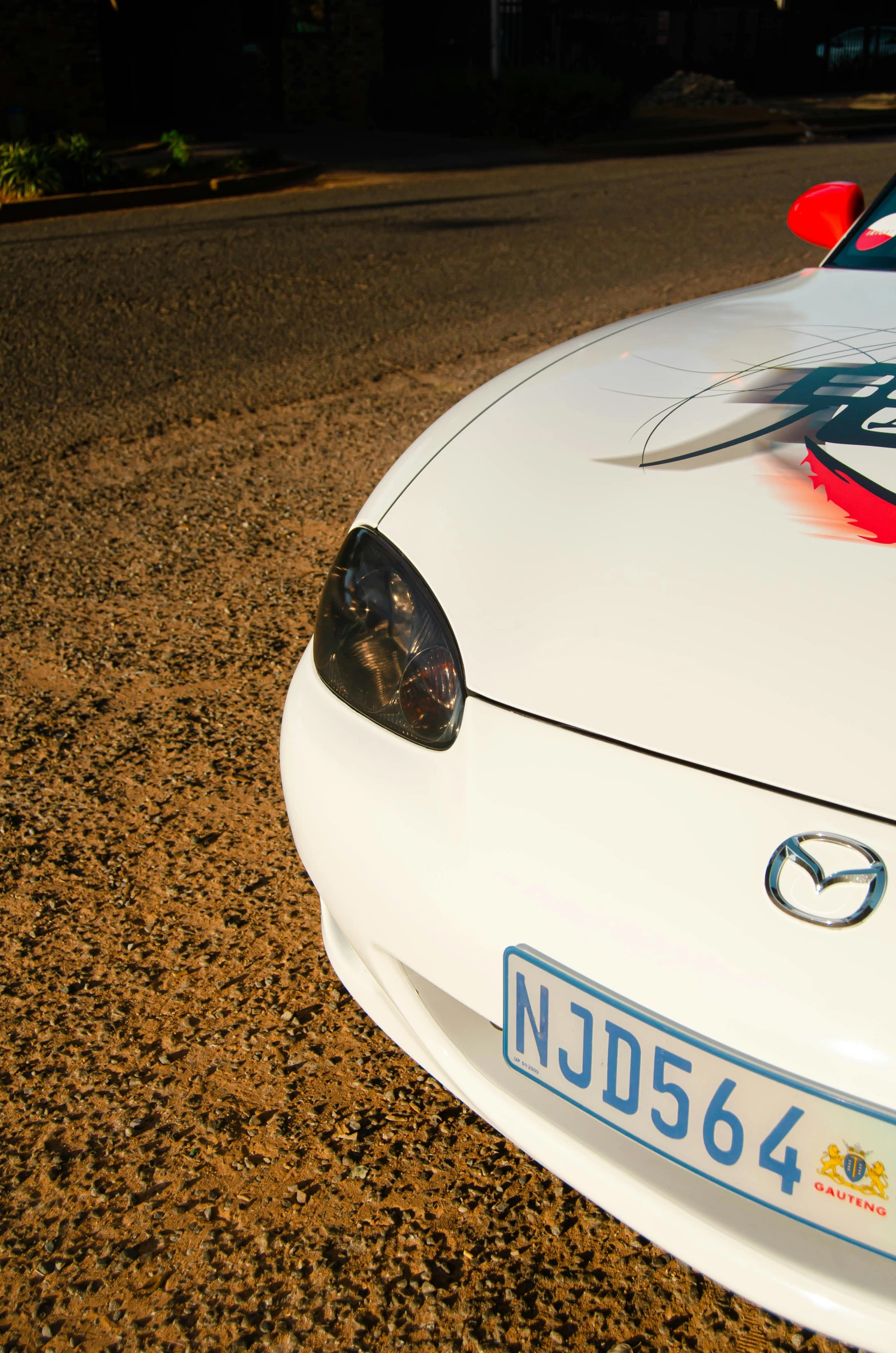 a close up view of a white police car