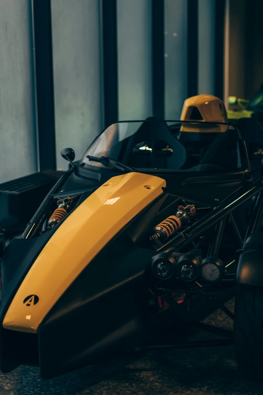 an extreme look at a black and yellow sport motorcycle