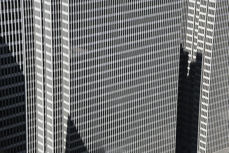 the building has vertical lines of color against the building