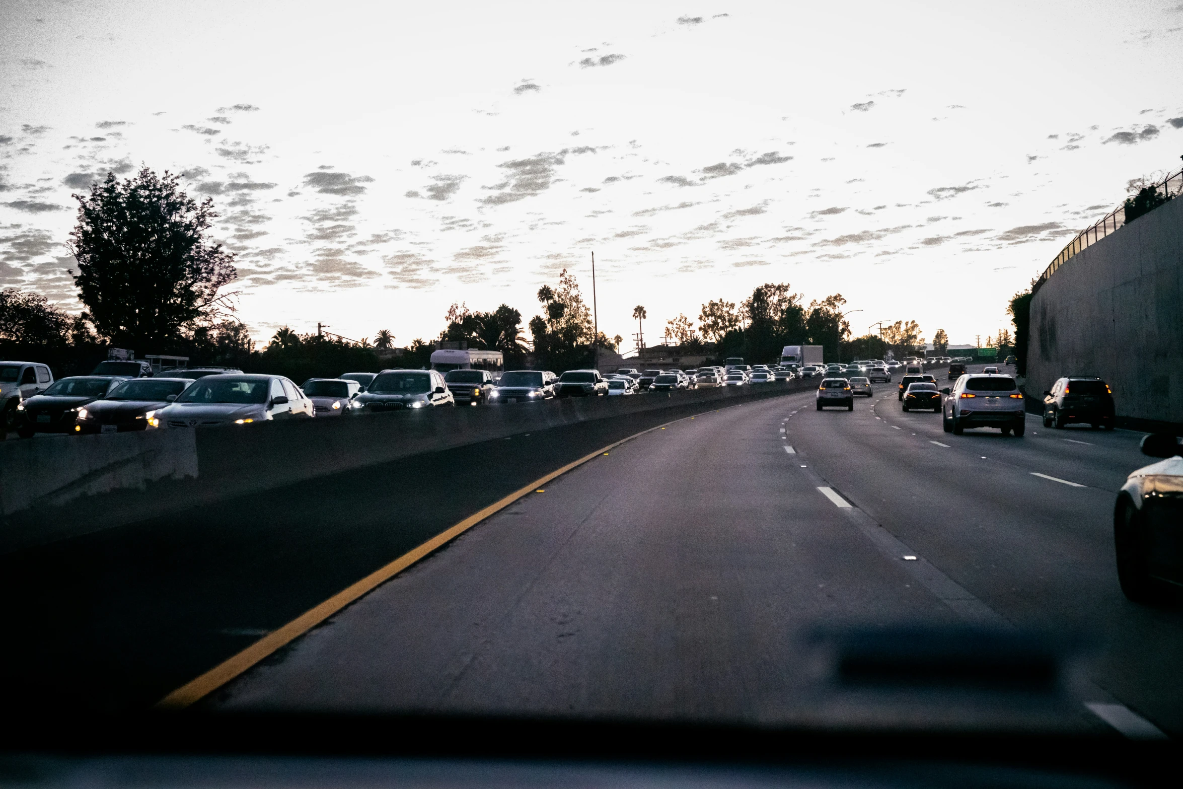 a highway with a lot of traffic going through it