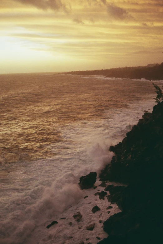 the person with surf board is taking a break