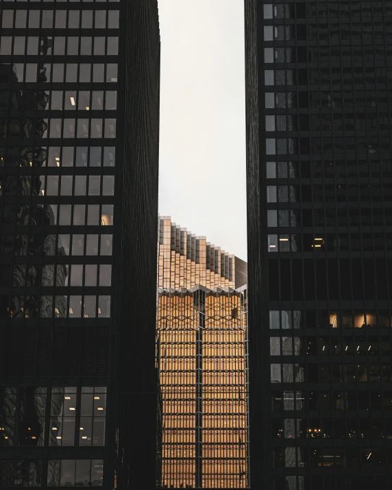 an image of a view of some skyscrs from the ground