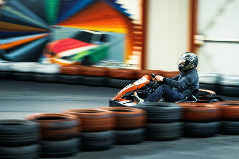 a person riding a motorcycle on top of a track