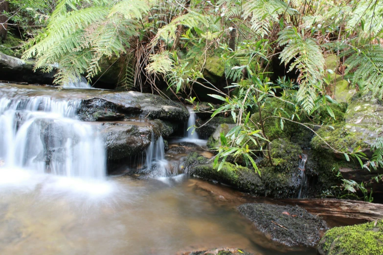 there are many small waterfalls running between the rocks