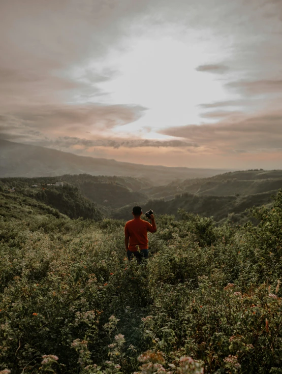 a person taking a po in the sky over a valley