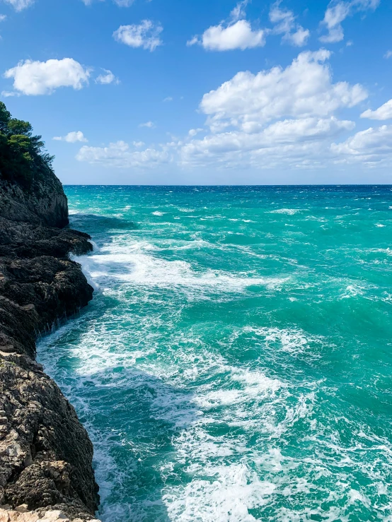 the ocean and cliff cliffs at the shoreline