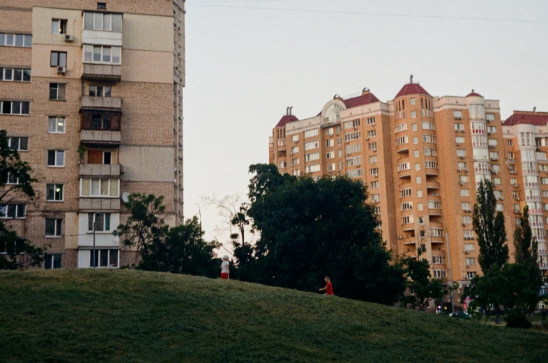 a couple of buildings on the side of a hill