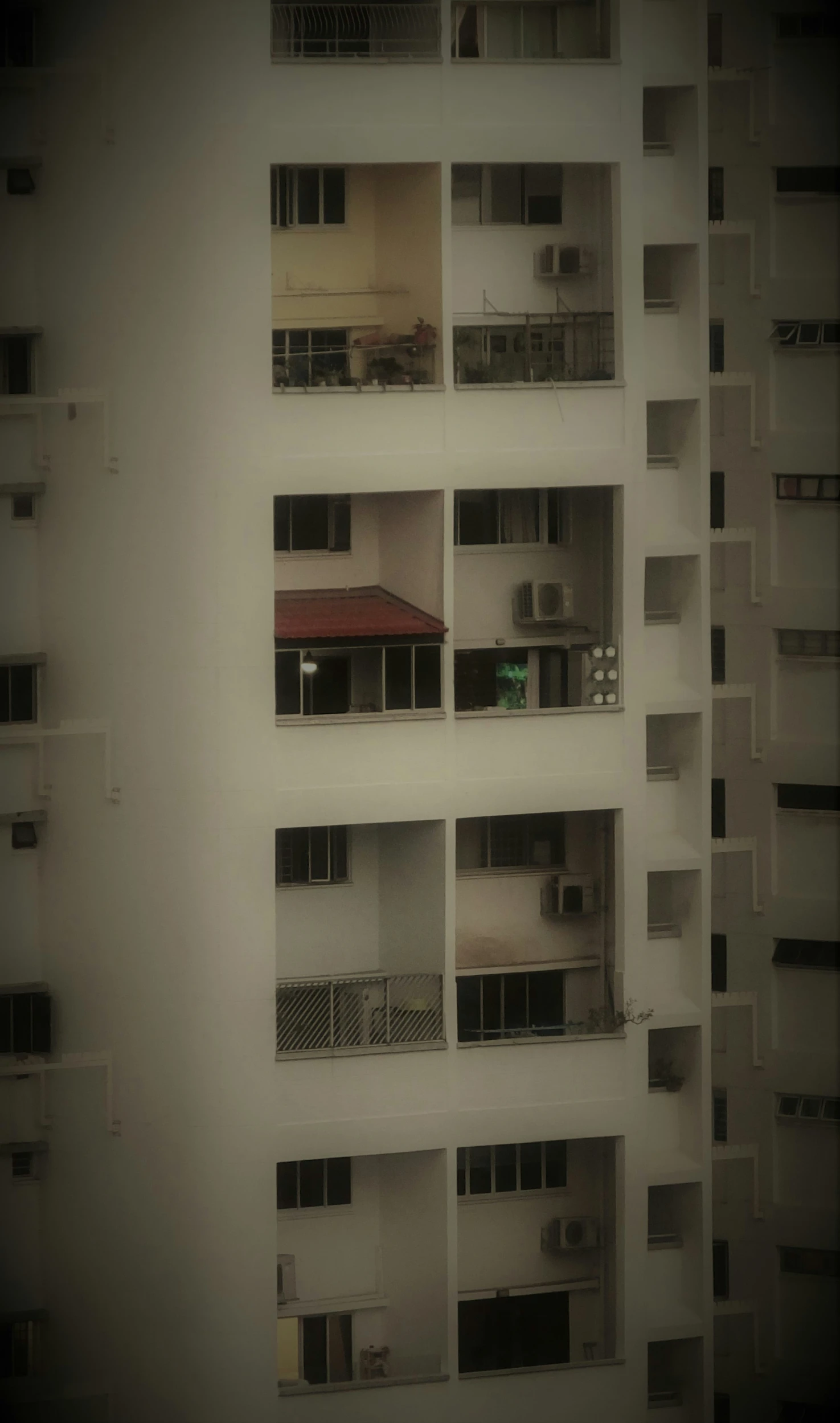 a few small windows on the side of a building