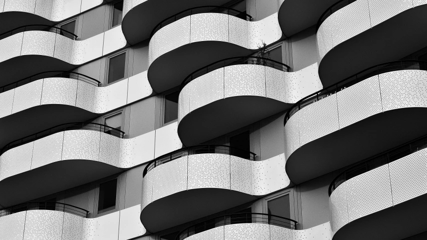 black and white image of brick facade of a building