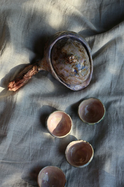 several brown bowls that have some items in them