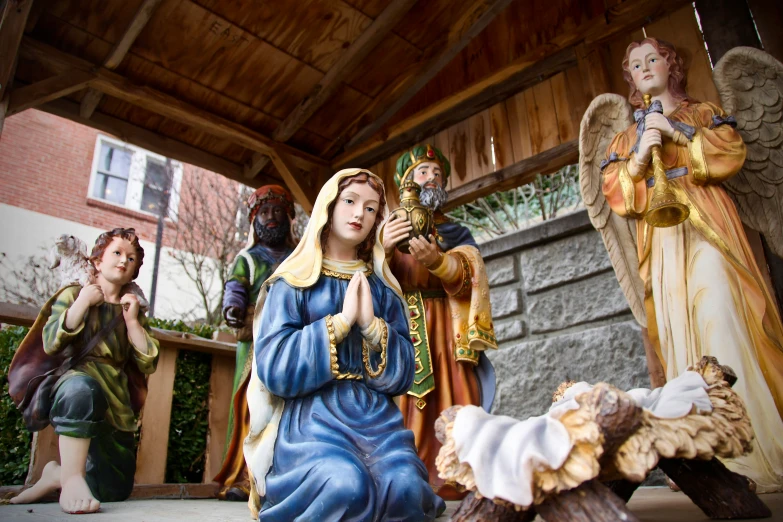 a christmas nativity scene in an outdoor setting