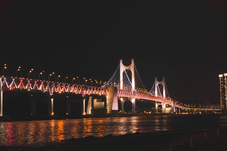 an image of a night scene with bridge