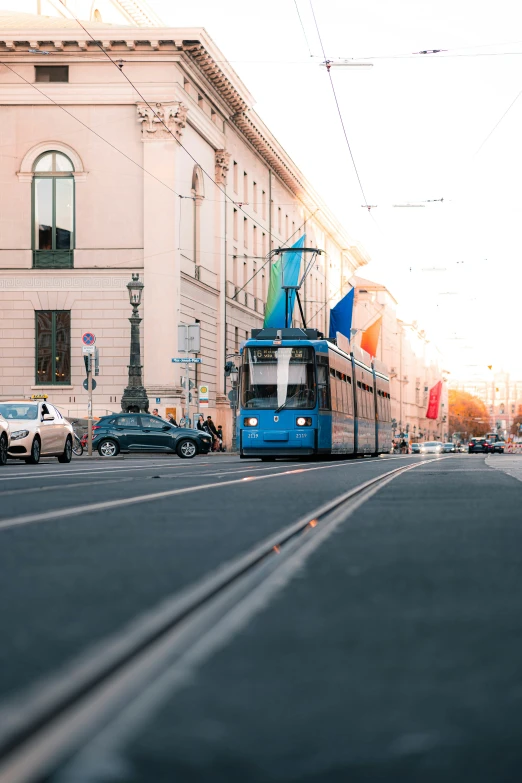 the bus is parked near the curb on the street