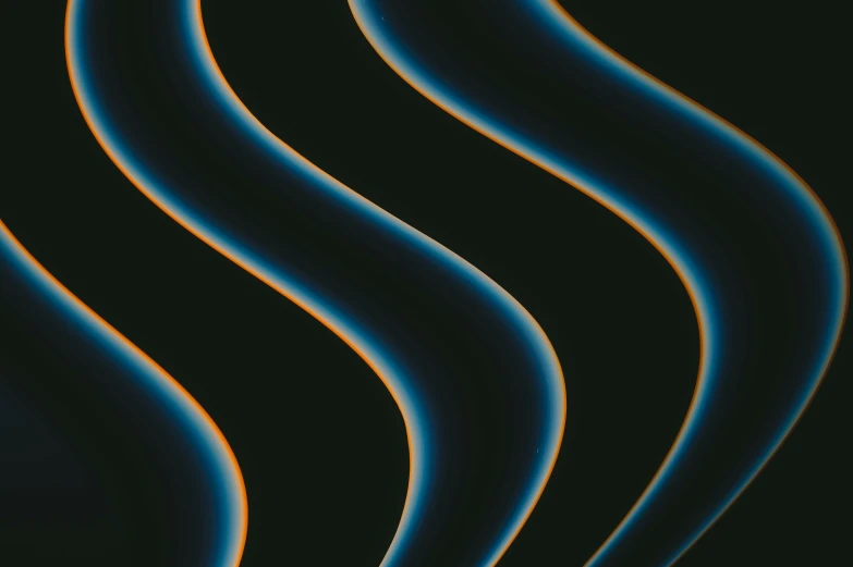 a black background with some interesting blue waves