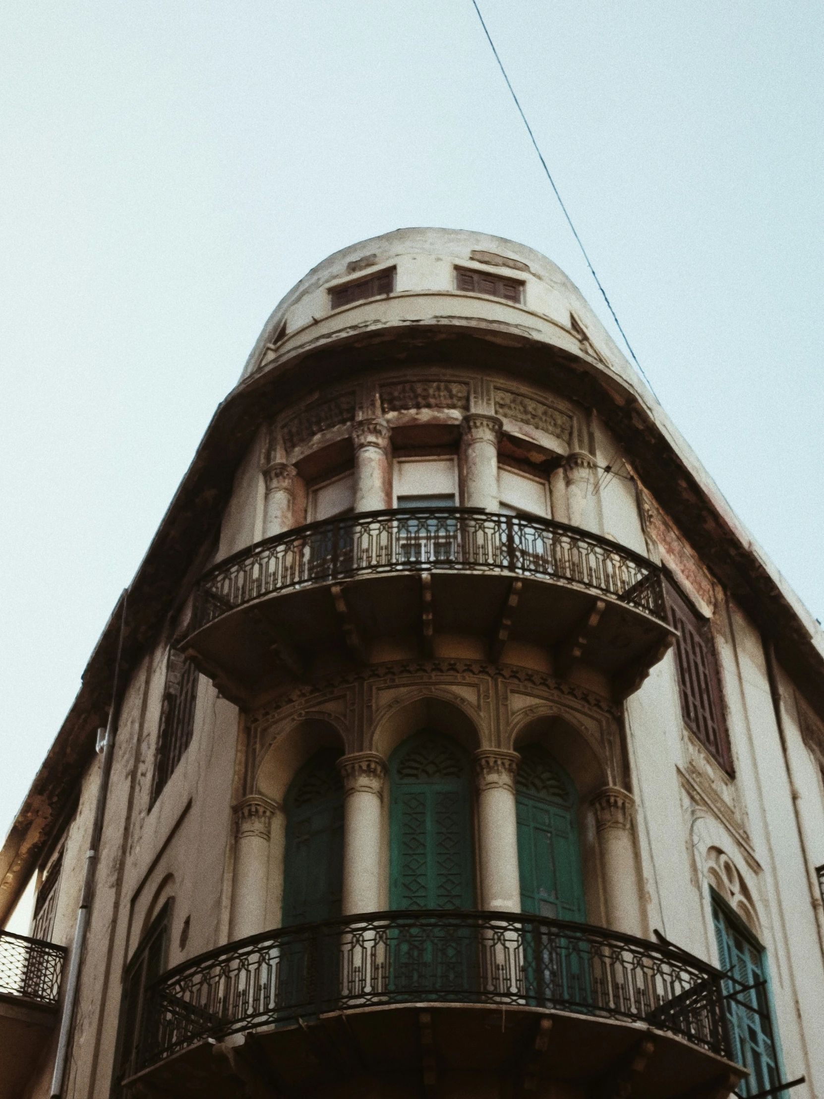 a large building with balcony and balcony balconies