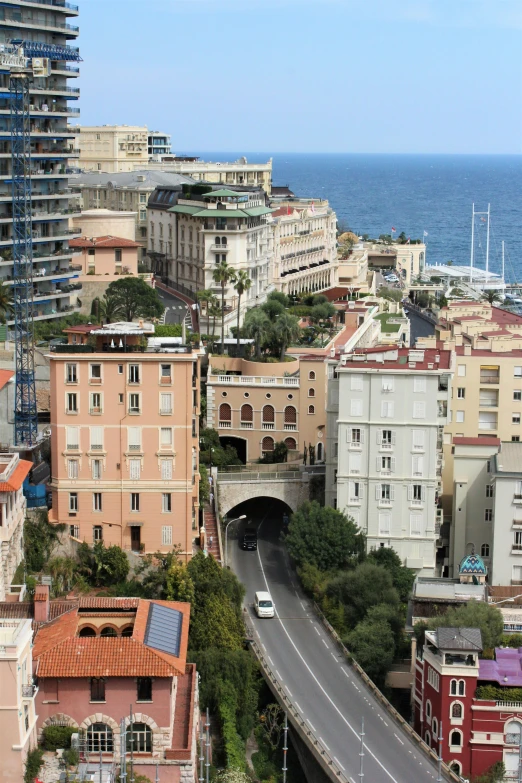 the freeway runs through a large city near some buildings