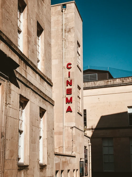 a building in a european city with a sign on the wall