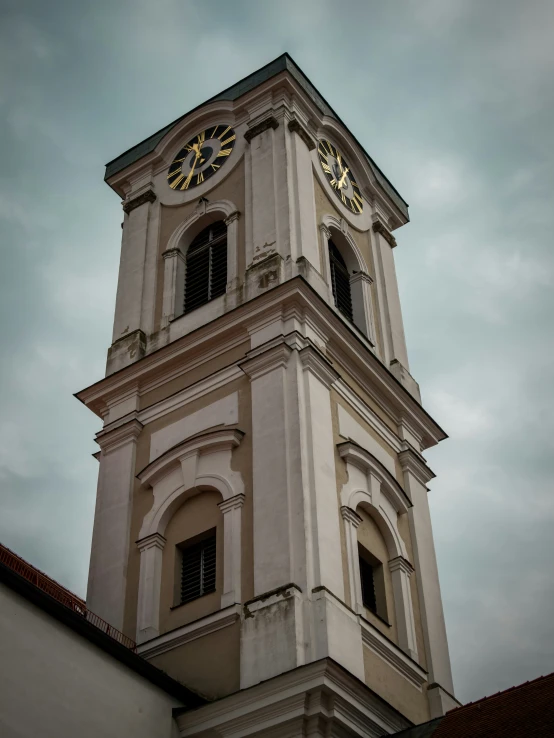 a clock that is on the side of a building