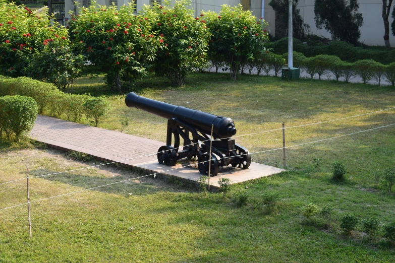 a large cannon sitting on top of a wooden platform