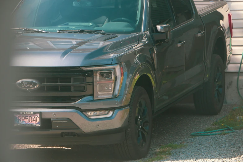 an exterior view of the new black ford f - 150