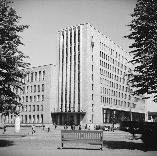 a city building with multiple floors and many stories in the windows