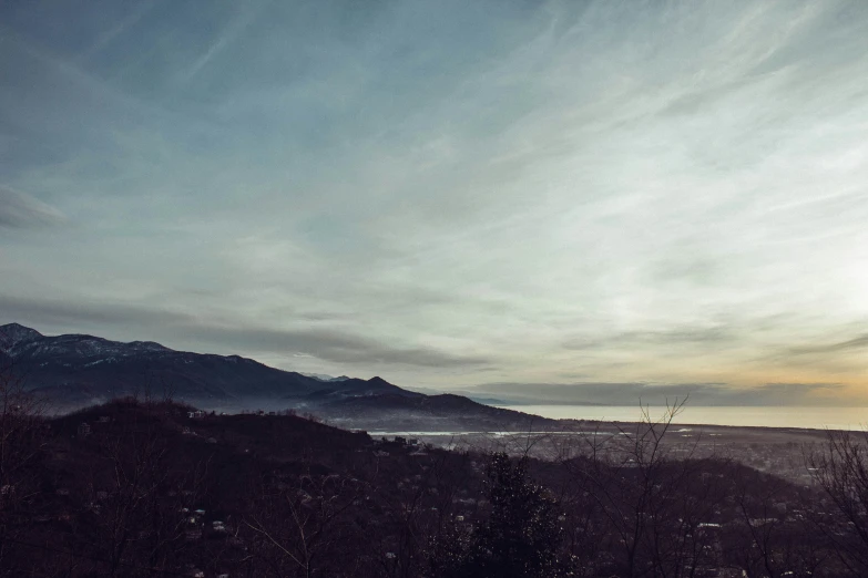 a very nice view of some hills and trees