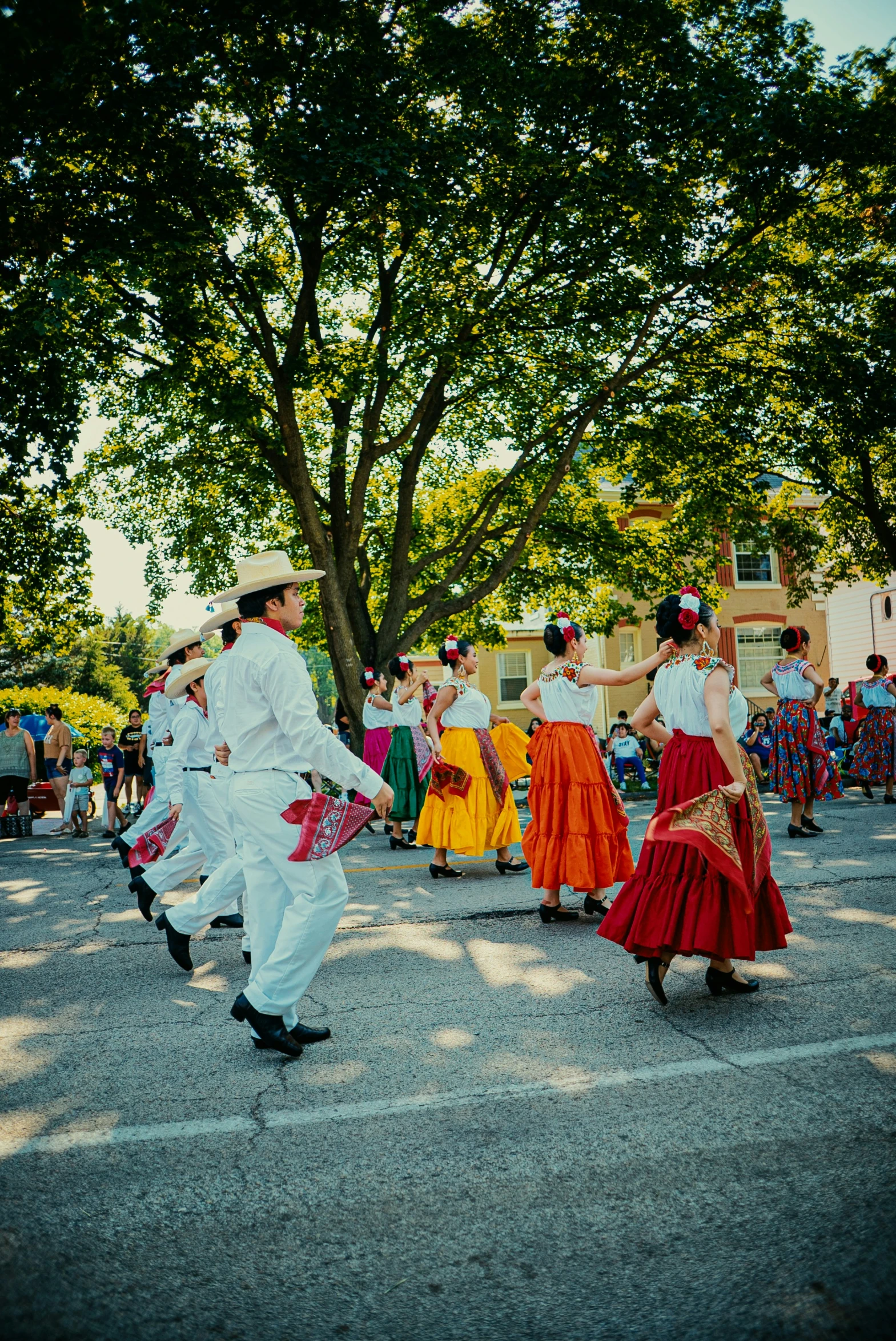 a number of people walking near one another