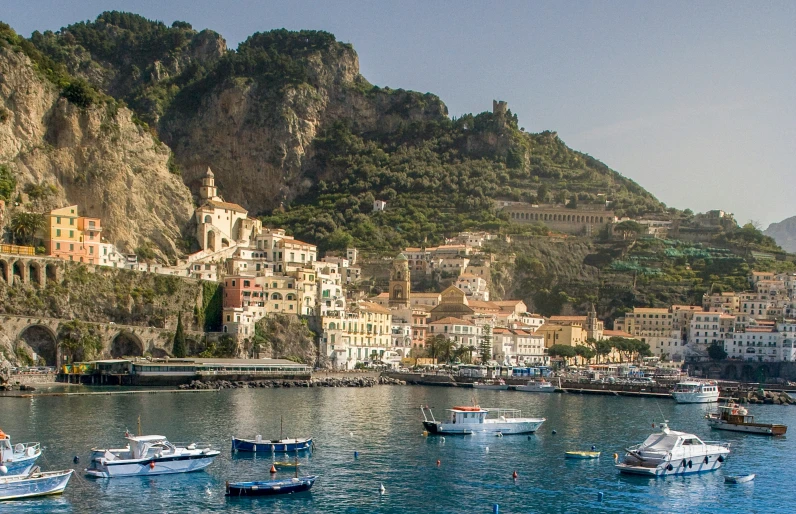 boats are sailing down the river in italy