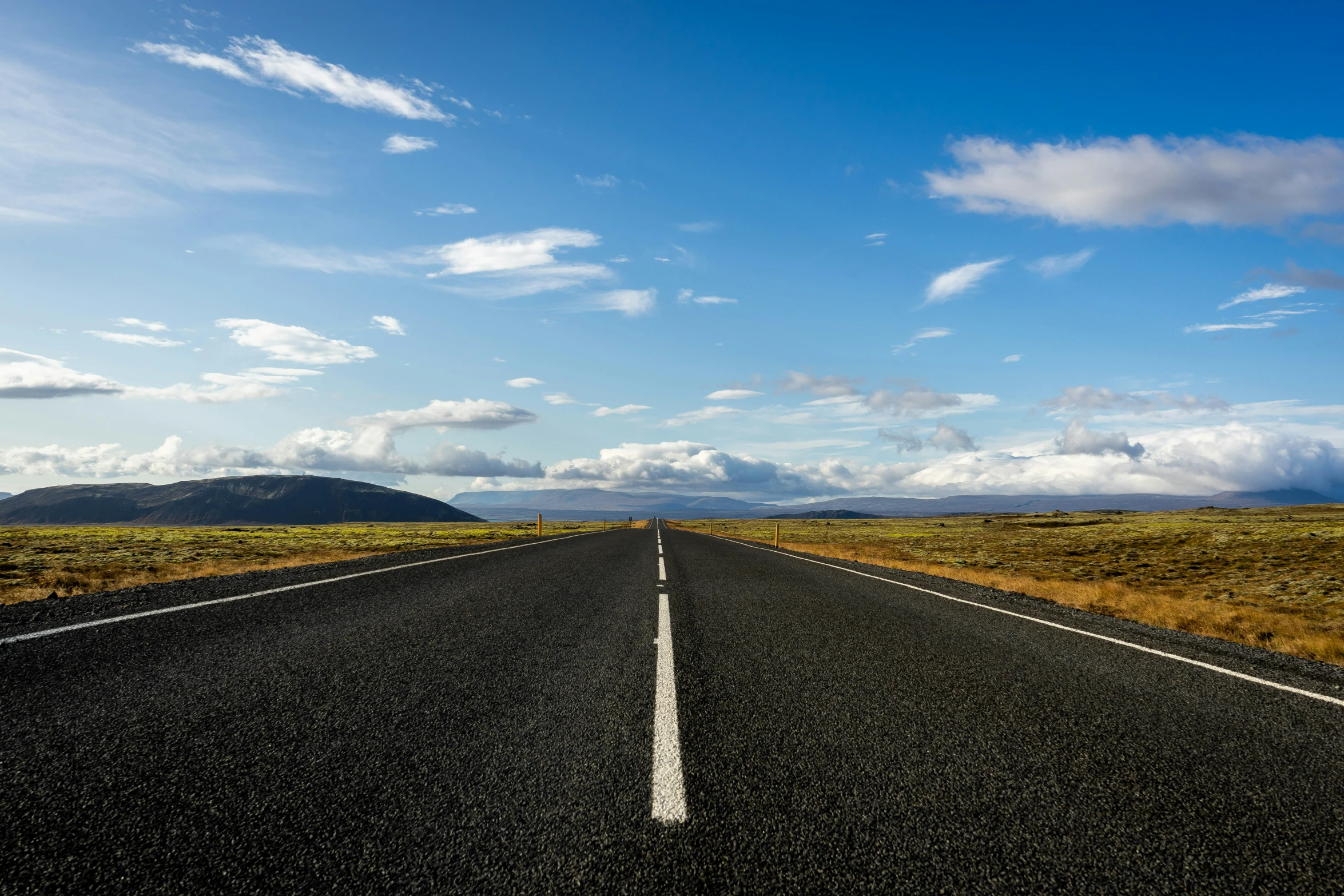 a long empty road stretching into the distance