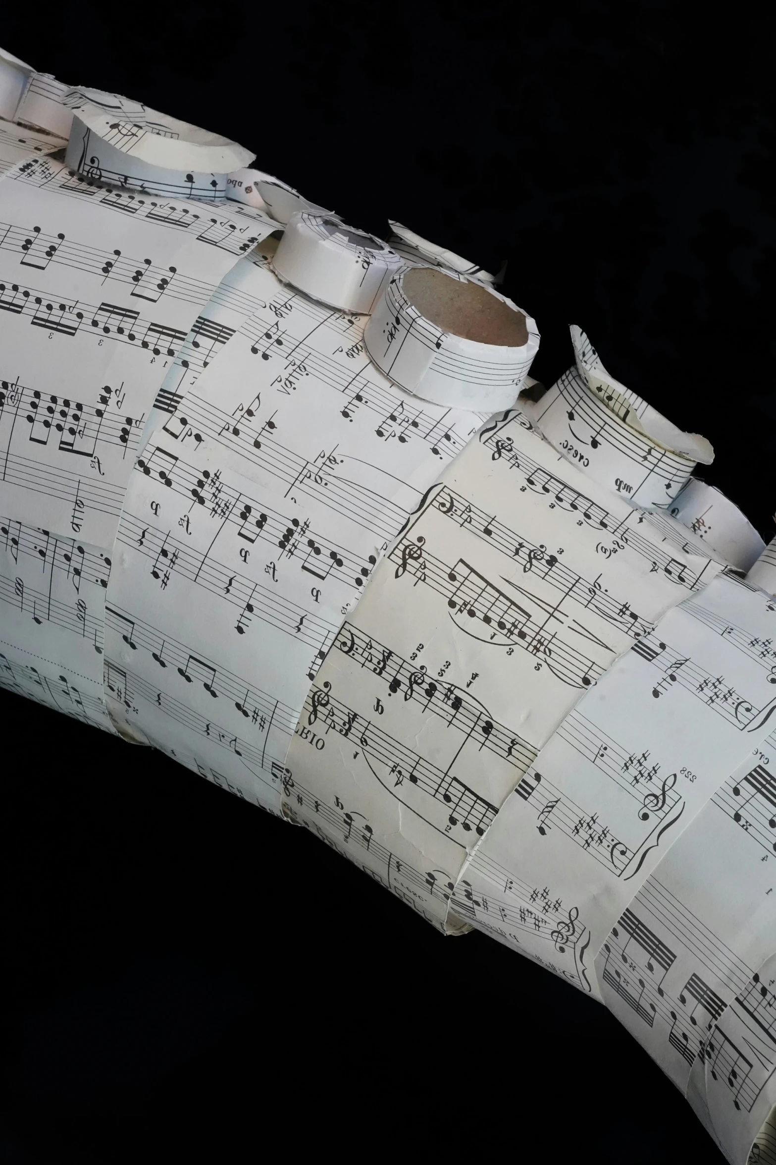 a handmade, folded sheet of music score