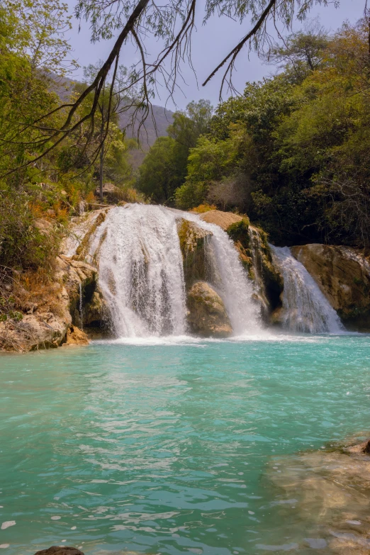 the waterfall has water running down it