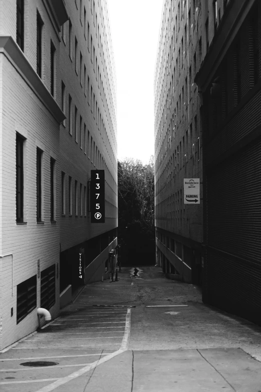 a narrow city street with no people on it