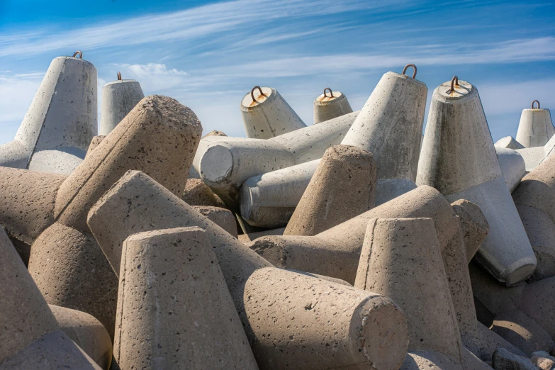 a lot of cement blocks and towers on a sunny day