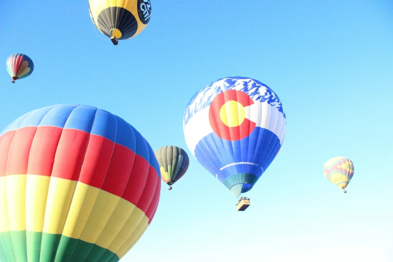 multicolored  air balloons are in the air