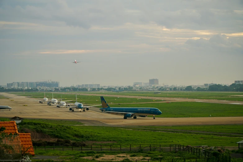 there are several planes on the ground near each other